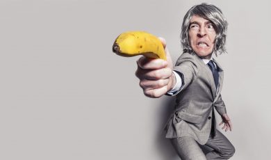 Man holding a banana )))